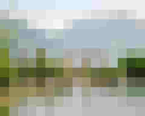 Naturbad mit Liegeplatz vor Alpenpanorama im Wellnesshotel Salzburger Land