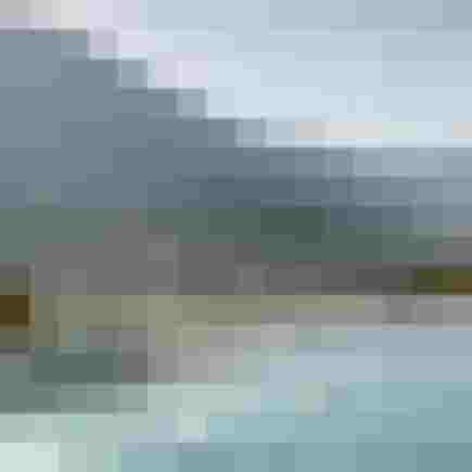 Infinity-Pool mit Blick auf Berge und Alpenpanorama im Wellnesshotel Salzburger Land