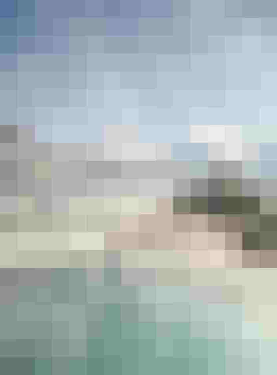 Dampfender Außenpool mit Alpenpanorama im luxuriösen Wellnesshotel im Salzburger Land